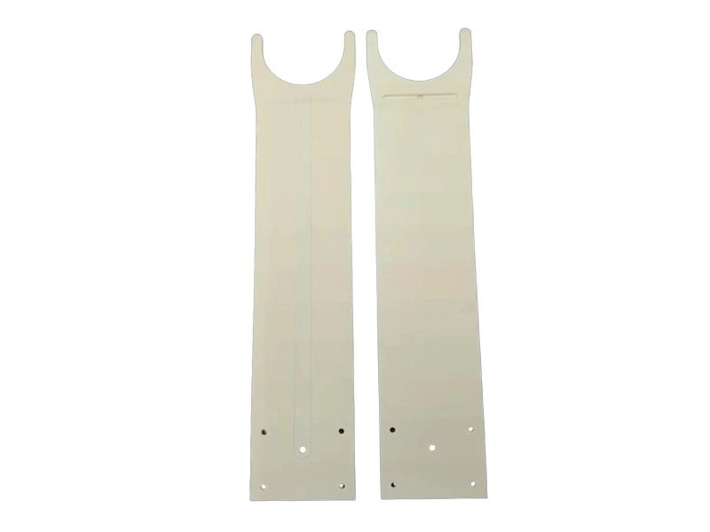 Ceramic vacuum arm